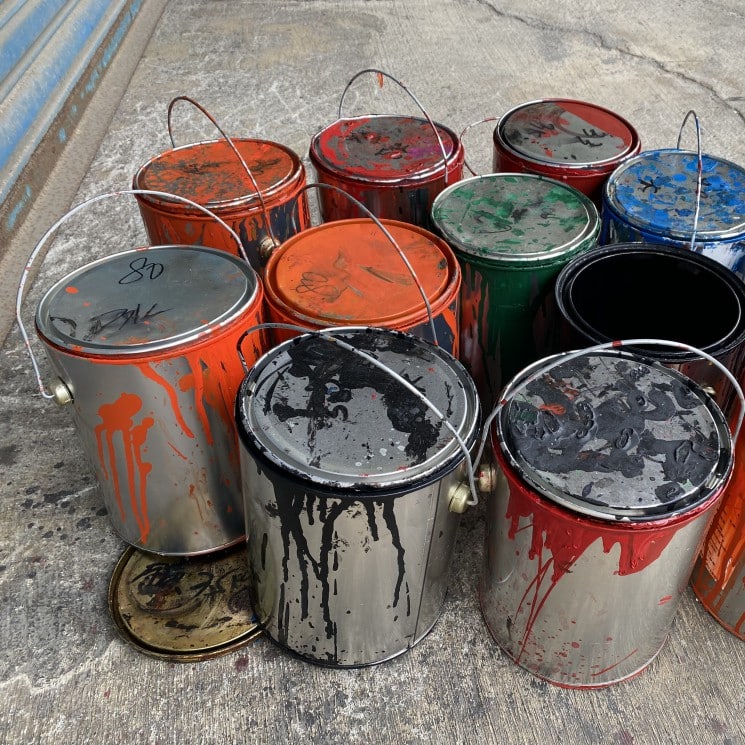 Discarded paint cans