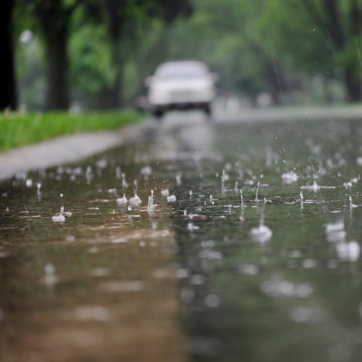 View of the street surface during rain.