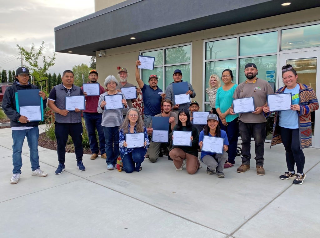 Green Gardener Graduates holding certificates of completion