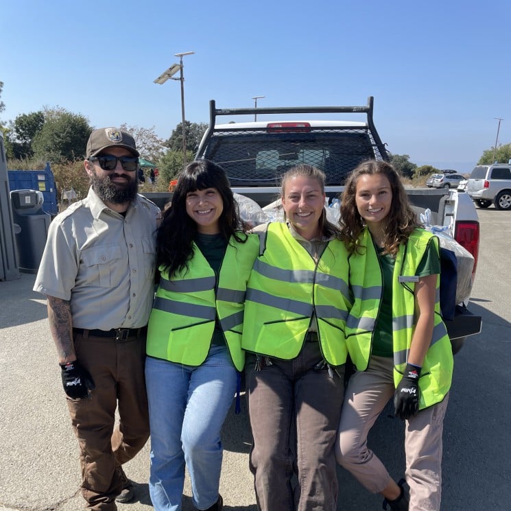 Volunteers sitting on truck