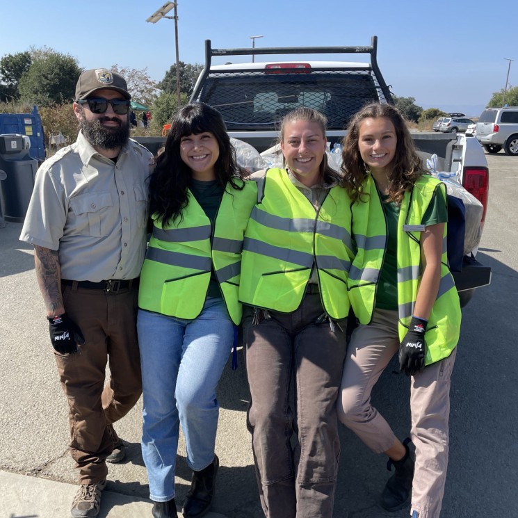 Volunteers sitting on truck